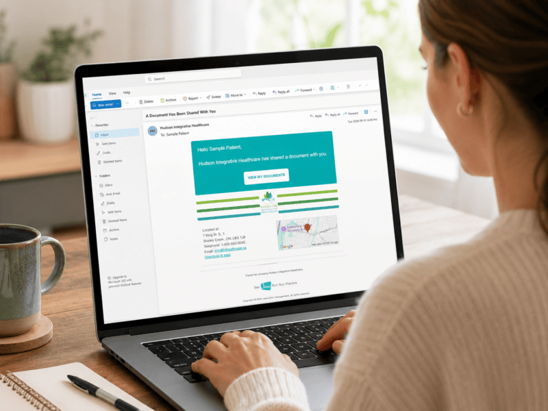 Patient viewing an email on a laptop showing that a document has been shared with them by Hudson Integrative Healthcare.